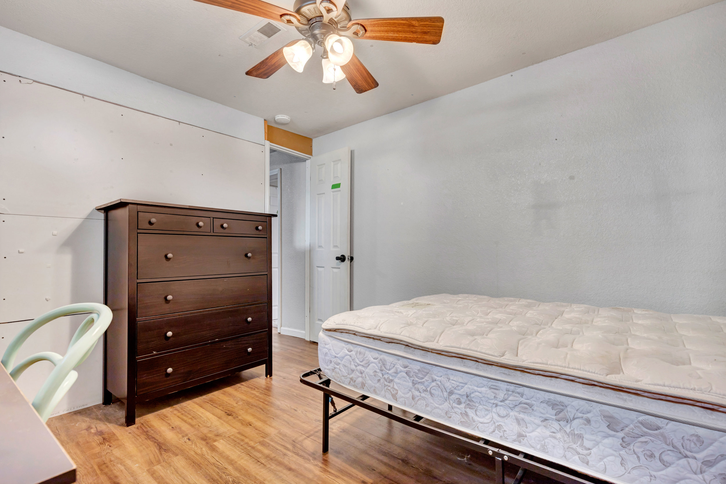 Furnished bedroom with keyless entry